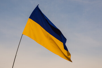 Ukraine - flag in blue sky. No war. Support for Ukraine