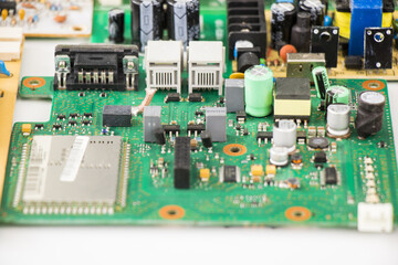 Closeup shot of an electronic motherboard and isometric processor and microchip