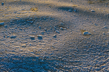 Close-up of snow and ice on surface of Baltic sea at winter.