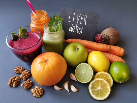 Liver detox juice in a glass jar with ingredients. Fresh smoothie for healthy liver and cleansing. Concept of liver disease diet. Liver detox super food after alcohol and over eating.