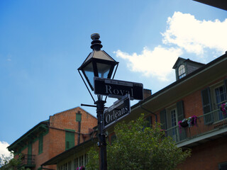 View of a street light with signs in New Orleans