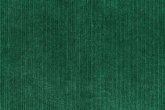 Corduroy fabric texture, green textile background