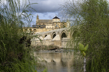 Roman bridge and Mosque-Cathedral on the Guadalquivir River of Cordoba, Spain