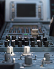 Closeup shot of radio buttons inside the Airbus 320 cockpit plane