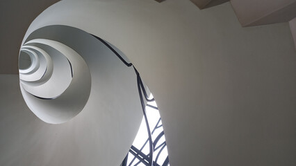 Low angle view of modern spiral building design