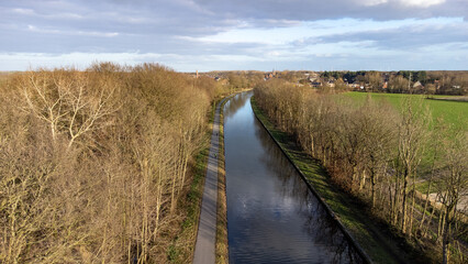 canal Dessel Schoten aerial photo in Rijkevorsel, kempen, Belgium, showing the waterway in the natural green agricultural landscape. High quality photo. High quality photo