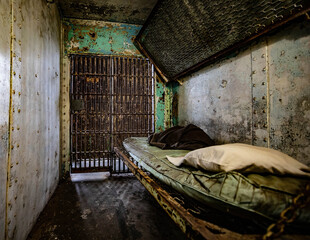 Photo of a rustic metal room in the prison