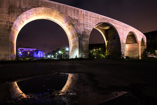 Illuminated arches of the Nagold viaduct in Germany at night