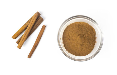cinnamon sticks and powder isolated on white