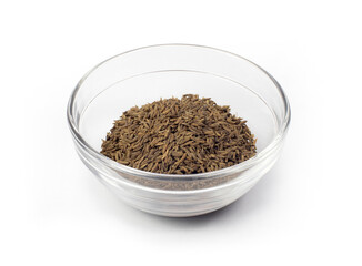 cumin seeds in glass bowl isolated on white background