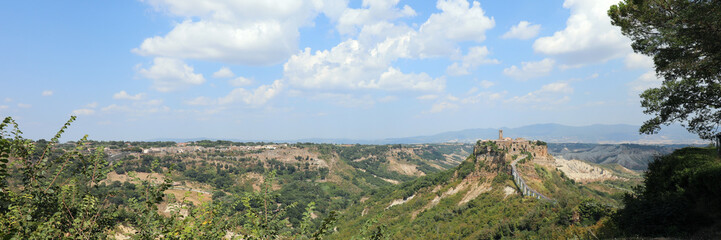 Fototapeta na wymiar Panoramic view of Village called Civita di Bagnoregio made with tufa rock in Central Italy