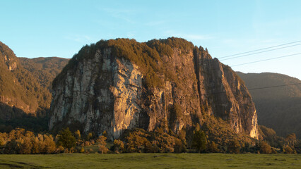 Photo of a high rock stands by the Rio Simpson in the Rio Simpson National Reserve in Patagonia © Wirestock Creators