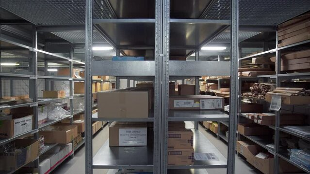 Warehouse with parcels. Creative. New premises for storage and transportation of parcels. Warehouse with lots of shelves and boxes