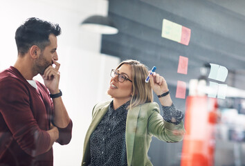 Great minds discuss ideas. Shot of young businesspeople in the office.