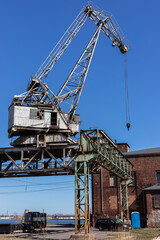 Fototapeta na wymiar An old shipyard truss crane