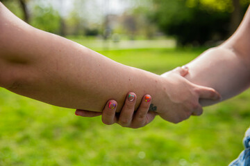 Lesbian couple holding each other.