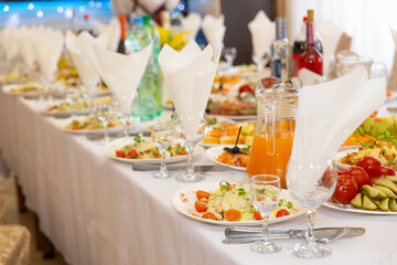 Table set for wedding or another catered event dinner.