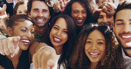 We choose you. Cropped shot of a group of happy businesspeople pointing at you while standing in their workplace lobby.