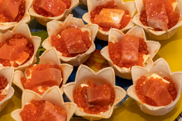 Fototapeta na wymiar Tartlets with caviar and salmon