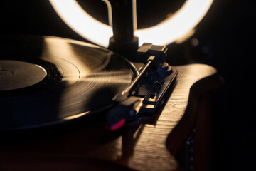 Vinyl record player in action. Old school style cinemagraph loop vinyl record player. Close up view of vintage plate player. Old style sound technology to play music. Rotating vintage phonograph  © Василь Івасюк