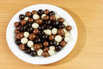 A mixture of crispy chocolate balls on a plate