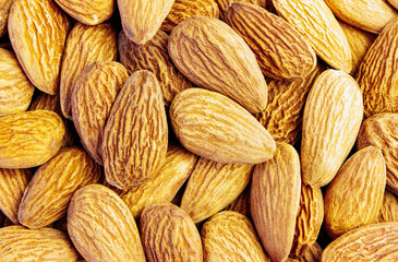 almond fruit texture background close up, top view