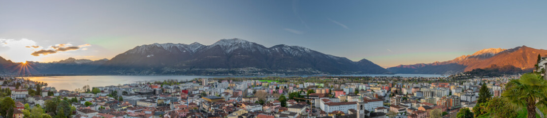 Fototapeta na wymiar View over Maggiore lake and Locarno town in spring sunny morning