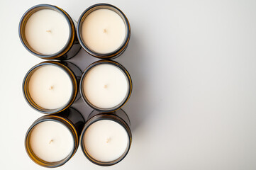 Candles in a line on white background