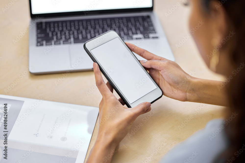 Poster i get business data on my phone. cropped shot of an unrecognizable businesswoman sitting alone in th