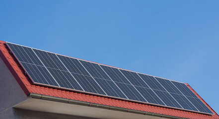 solar panels on red roof