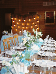 wedding table setting. wedding table decoration. wedding table decoration with candles. wedding table setting. table set for a wedding reception. table set for a dinner.