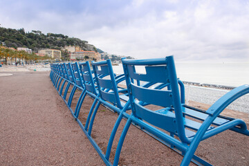 The blue chairs on the Promenade des Anglais in Nice, France