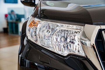 headlight on new black Toyota land cruiser prado.