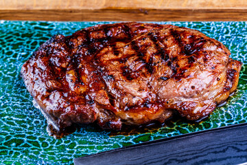 Beef rib-eye steak. Close up