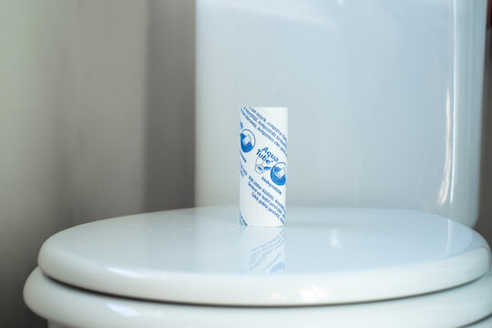 Tallinn, Estonia - 04.12.2022: Aqua tube or Aquatube is toilet paper roll which can be flushed down the toilet. Biodegradable, recyclable and compostable toilet paper tube.