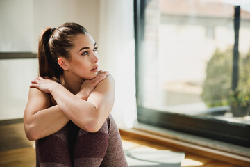 Woman Resting After Workout At Home