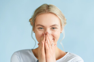 Young hipster blonde woman with trendy make-up cute smiling. Natural emotions