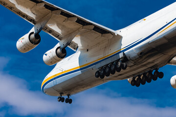 Huge cargo plane is approaching the runway and is about to land