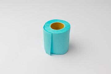 roll of blue toilet paper isolated on white background