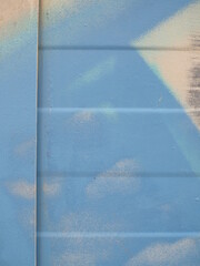 Detalle de valla con pintura azul