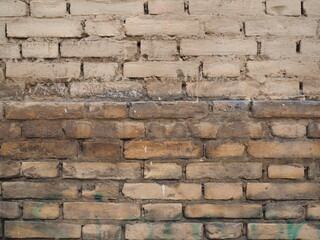 Pared de ladrillos de estilo antiguo en fachada de edificio