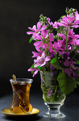Hibiscus and hibiscus flower tea in vase