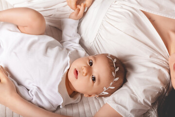 Adorable caucasian baby girl portrait. Top view. 