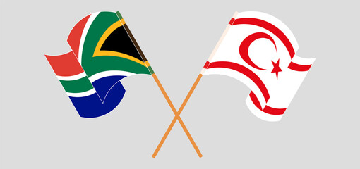 Obraz premium Crossed and waving flags of South Africa and Northern Cyprus