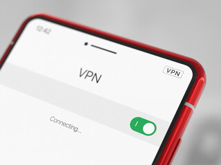 Close-up of a red smartphone with VPN enabled. A modern cell phone with a VPN enabled, on a light...