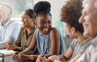 Laughter can brighten up your day. Shot of a group of businesspeople in a meeting at work. - Powered by Adobe