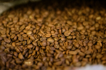 Closeup of brown roasted coffee beans background