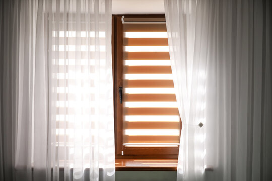 Window With Roller Blinds In Modern Room