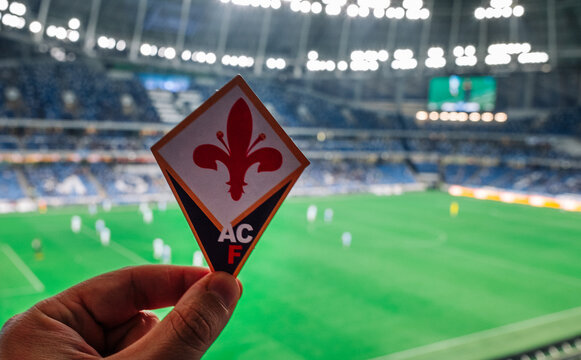 September 12, 2021, Florence, Italy. The emblem of the football club ACF Fiorentina against the background of the modern stadium.