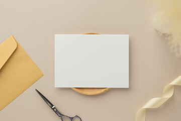 Blank greeting card invitation Mockup 5x7 on envelope with dry flowers and ribbon on paper background, flat lay, mockup